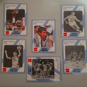 Coach Dean Smith ,Larry Miller, Sam Perkins ,John yokley